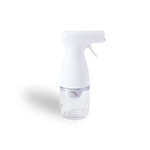 Clear glass bottle with white cap on a white background