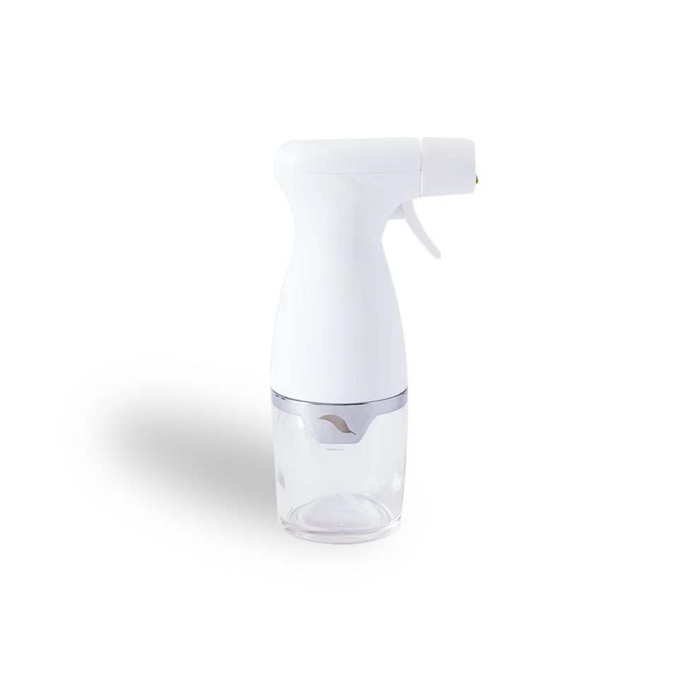 Clear glass bottle with white cap on a white background